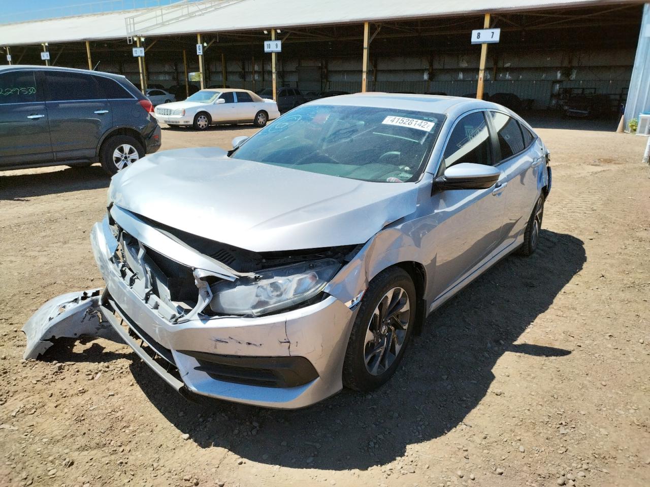Photo 2 from auction – 2016 HONDA CIVIC EX with VIN 2HGFC2F75GH505170