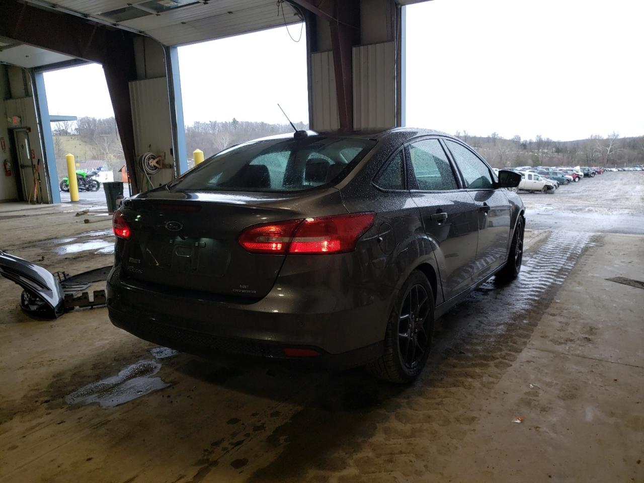 Photo 4 from auction – 2016 FORD FOCUS SE with VIN 1FADP3F20GL226786