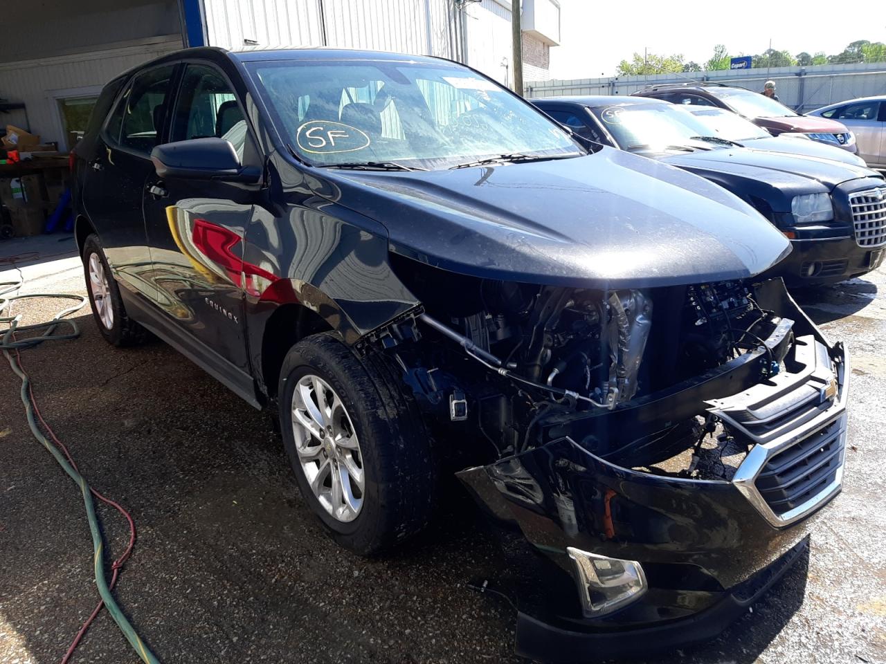 CHEVROLET EQUINOX LS 2018 with VIN 3GNAXHEV4JL359477 - Photo from auction