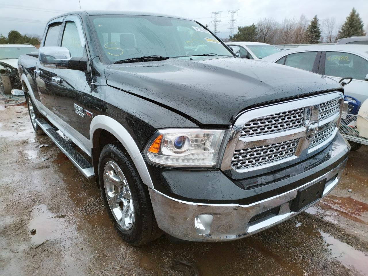 RAM 1500 LARAM 2015 with VIN 1C6RR7VM3FS678957 - Photo from auction
