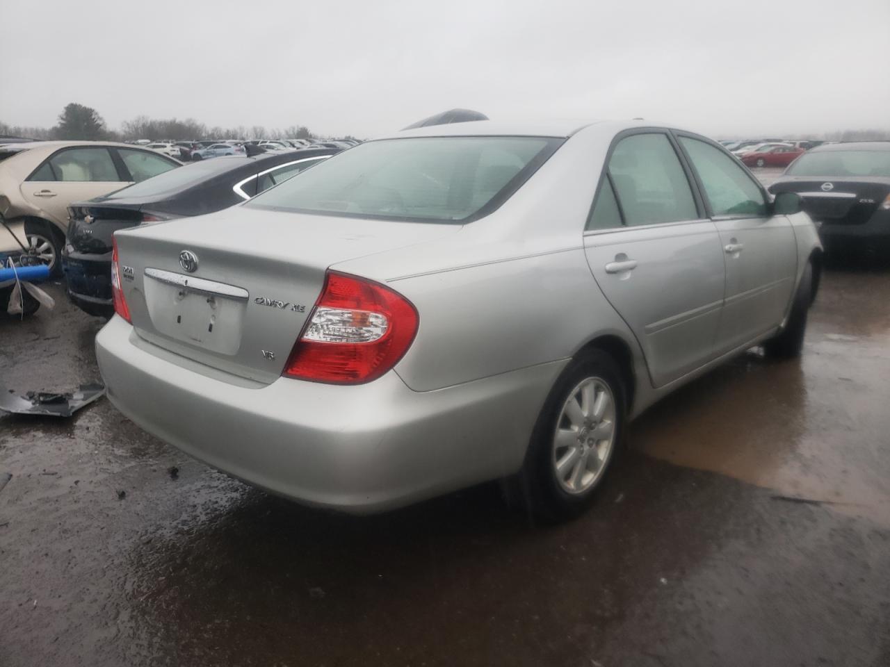 Photo 4 from auction – 2003 TOYOTA CAMRY LE with VIN 4T1BF30KX3U060693