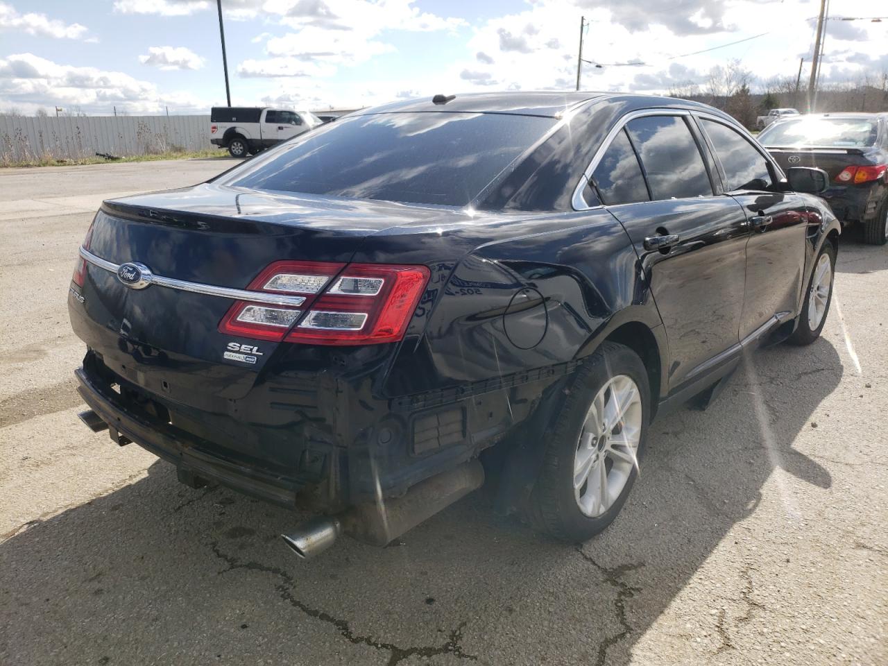 Photo 4 from auction – 2016 FORD TAURUS SEL with VIN 1FAHP2H86GG111695
