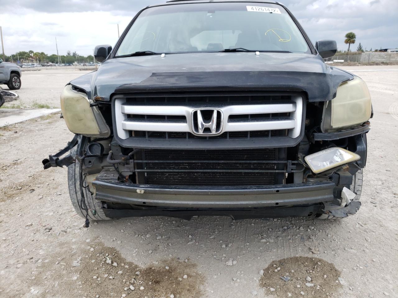 Photo 9 from auction – 2006 HONDA PILOT EX with VIN 5FNYF286X6B049898