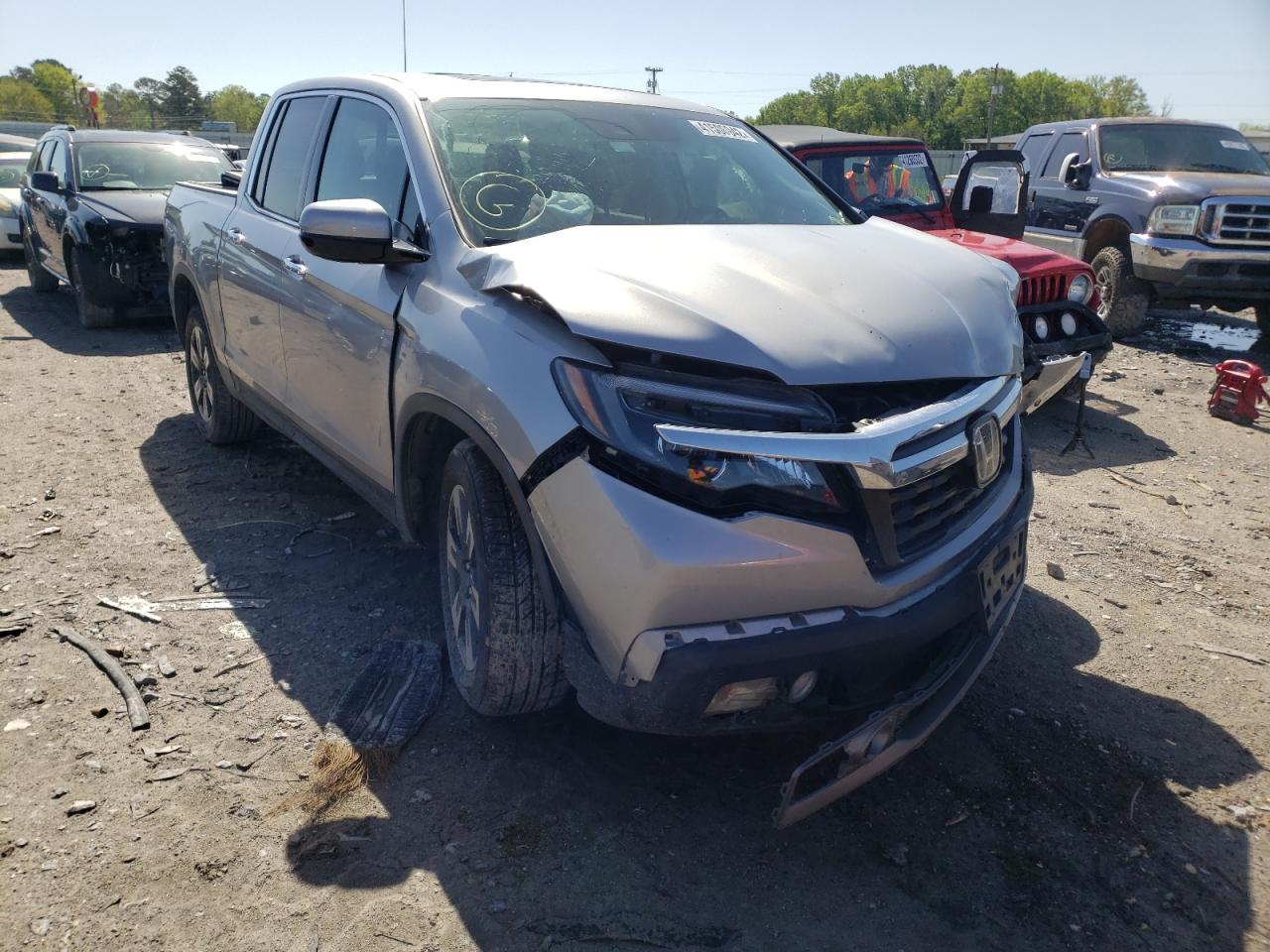 HONDA RIDGELINE 2017 with VIN 5FPYK3F73HB011856 - Photo from auction