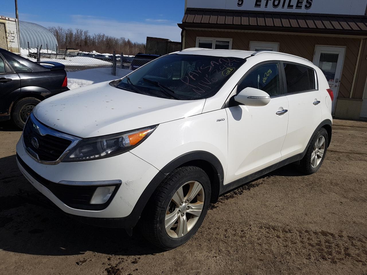 Photo 2 from auction – 2011 KIA SPORTAGE E with VIN KNDPCCA21B7073489