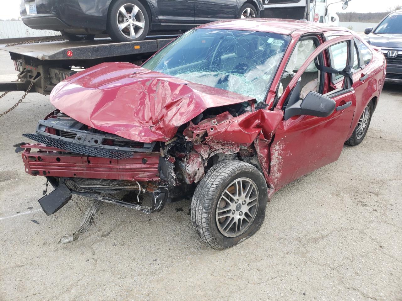 Photo 2 from auction – 2011 FORD FOCUS SE with VIN 1FAHP3FN7BW182742