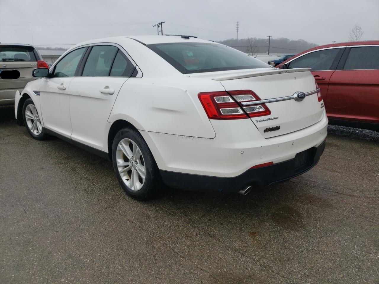 Photo 3 from auction – 2014 FORD TAURUS SEL with VIN 1FAHP2E85EG130952