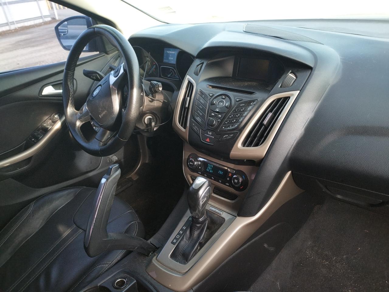 Photo 9 from auction – 2012 FORD FOCUS SEL with VIN 1FAHP3M20CL120577