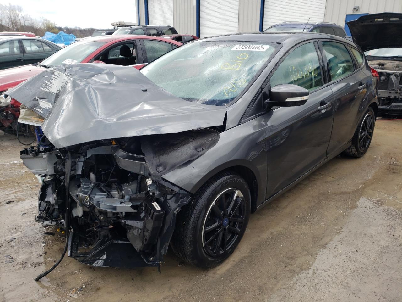 Photo 2 from auction – 2017 FORD FOCUS SE with VIN 1FADP3K21HL215870