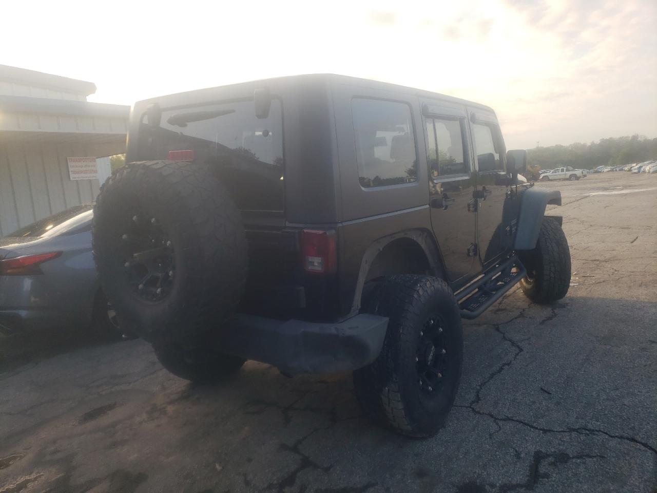 Photo 4 from auction – 2010 JEEP WRANGLER U with VIN 1J4BA3H17AL163064