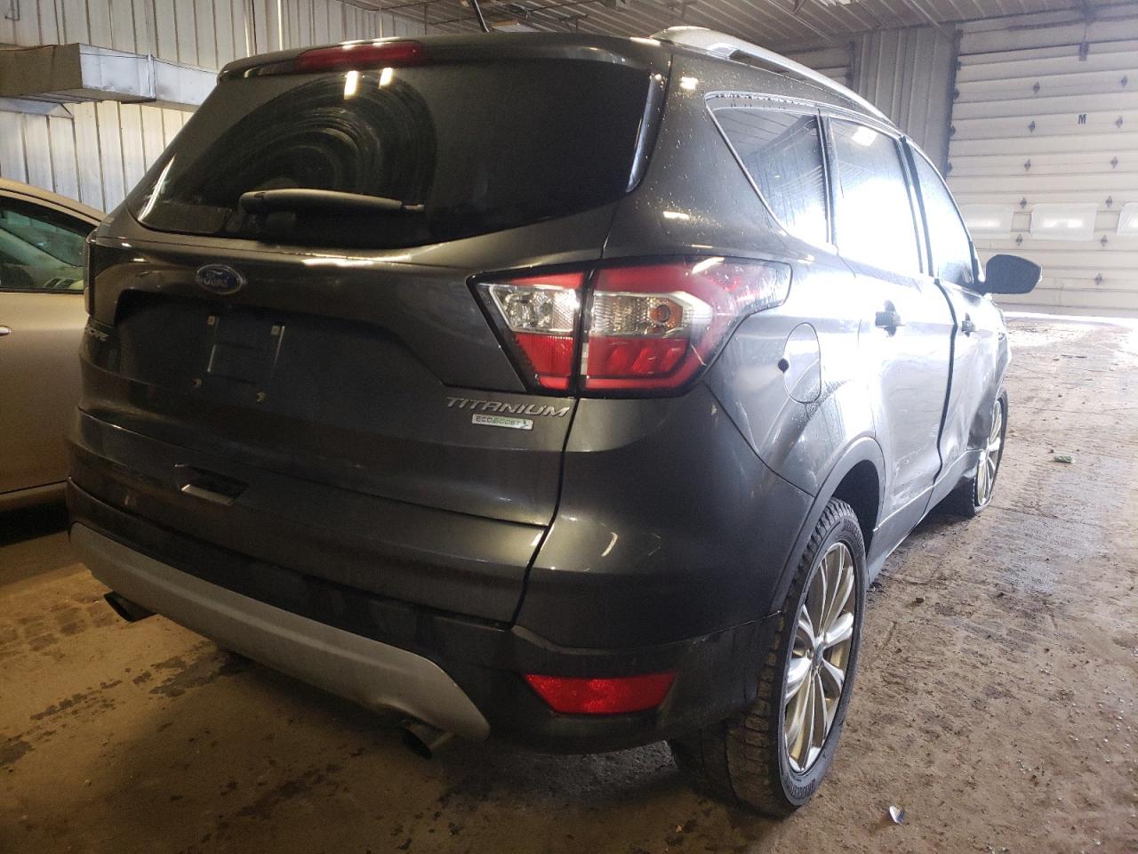 Photo 4 from auction – 2017 FORD ESCAPE TIT with VIN 1FMCU0JD2HUE92131
