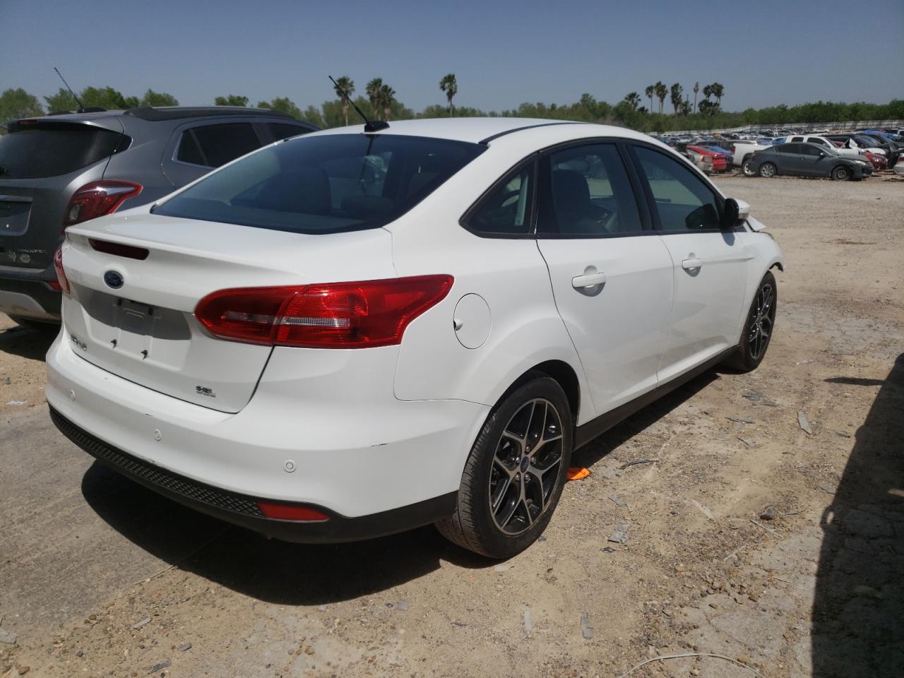 Photo 4 from auction – 2018 FORD FOCUS SEL with VIN 1FADP3H27JL236137