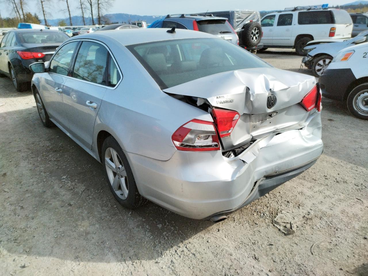 Photo 3 from auction – 2013 VOLKSWAGEN PASSAT SE with VIN 1VWBP7A33DC064539