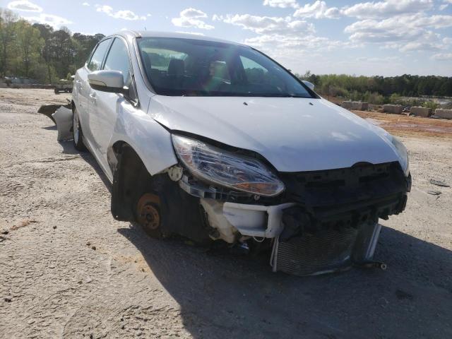 FORD FOCUS SE 2014 with VIN 1FADP3F25EL219006 - Photo from auction