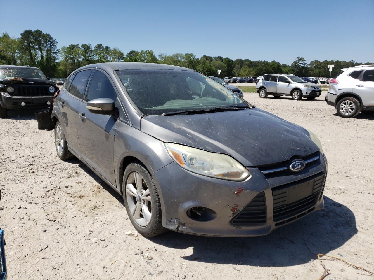 FORD FOCUS SE 2013 with VIN 1FADP3K24DL244063 - Photo from auction