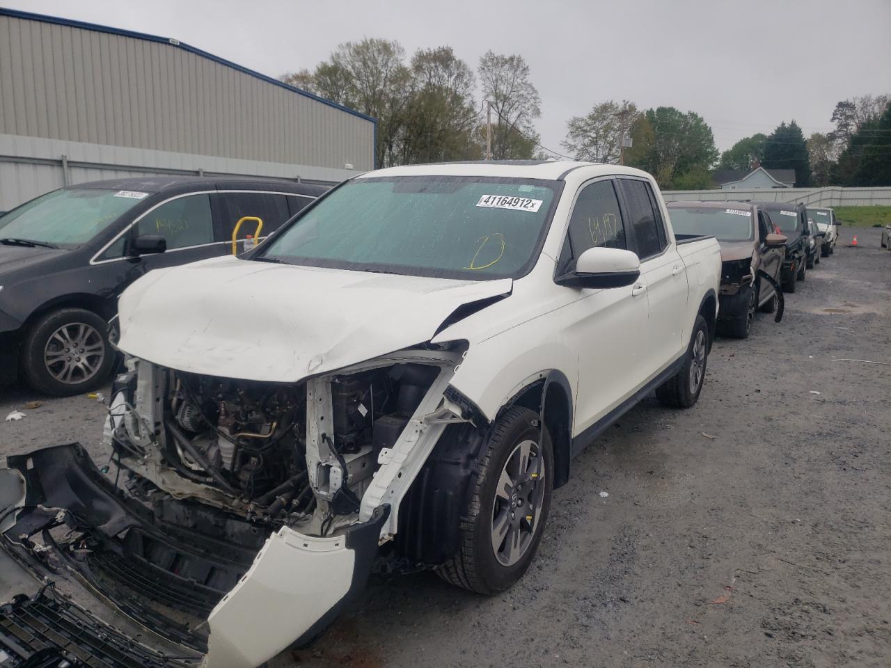 Photo 2 from auction – 2019 HONDA RIDGELINE with VIN 5FPYK3F55KB008978