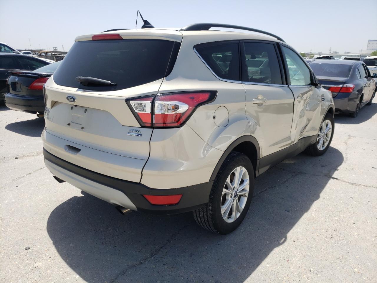Photo 4 from auction – 2018 FORD ESCAPE SEL with VIN 1FMCU9HD0JUB55778