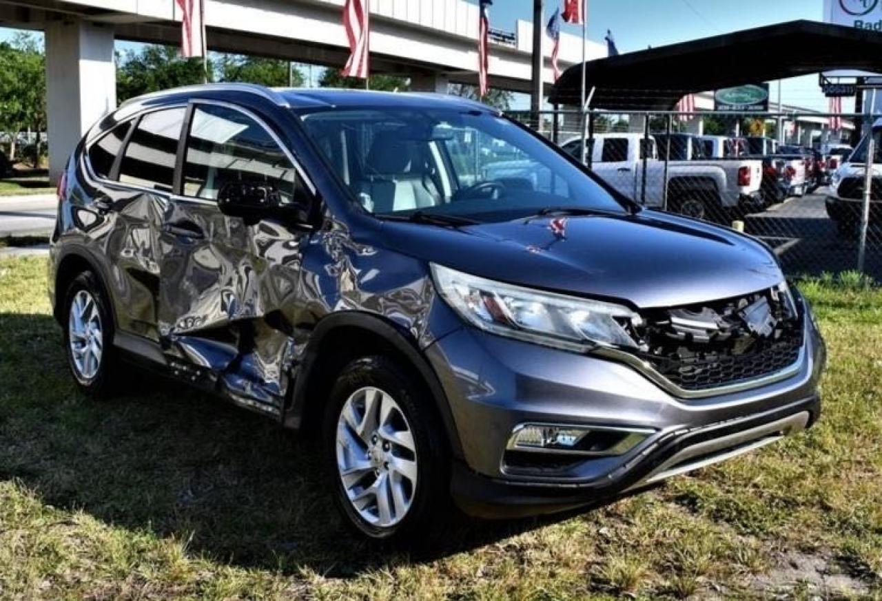 Photo 1 from auction – 2015 HONDA CR-V EXL with VIN 2HKRM3H74FH503203