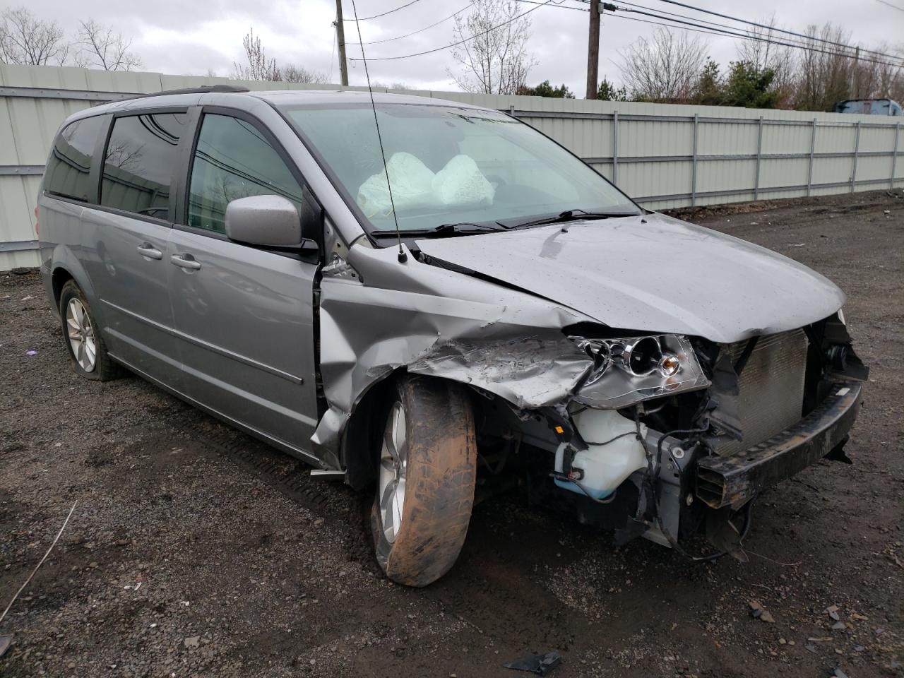DODGE GRAND CARA 2016 with VIN 2C4RDGCG5GR361978 - Photo from auction