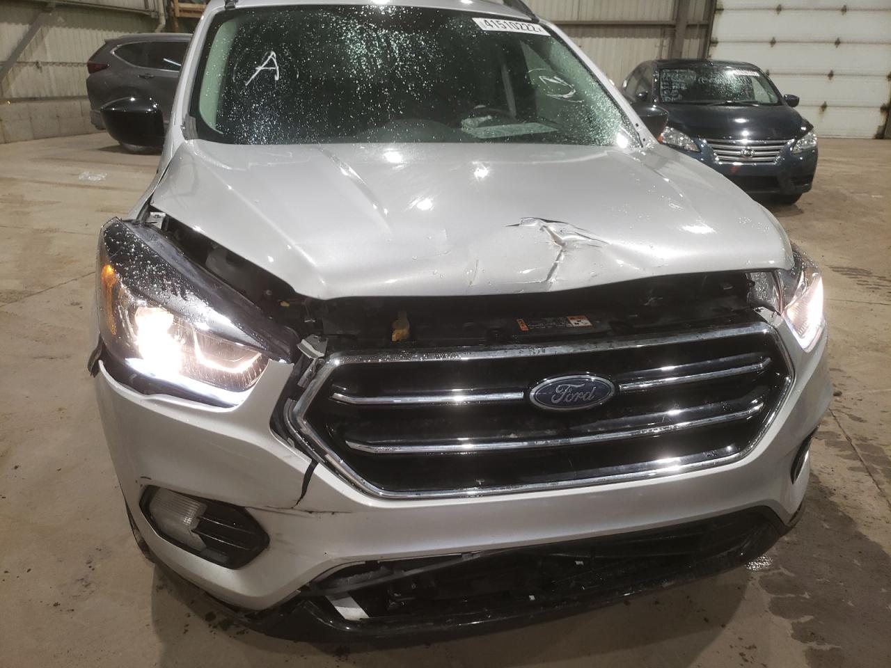 Photo 9 from auction – 2018 FORD ESCAPE SE with VIN 1FMCU9GD3JUD32339
