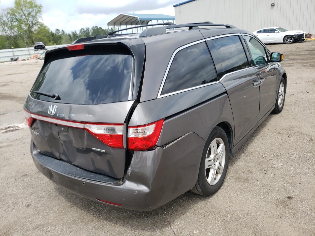 Photo 4 from auction – 2011 HONDA ODYSSEY TO with VIN 5FNRL5H9XBB095931