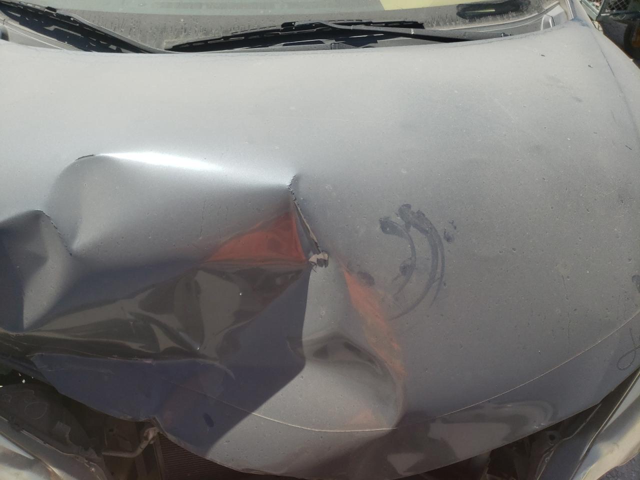 Photo 7 from auction – 2014 TOYOTA COROLLA EC with VIN 5YFBPRHE0EP032971