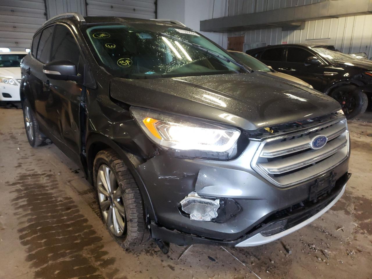 FORD ESCAPE TIT 2017 with VIN 1FMCU0JD2HUE92131 - Photo from auction