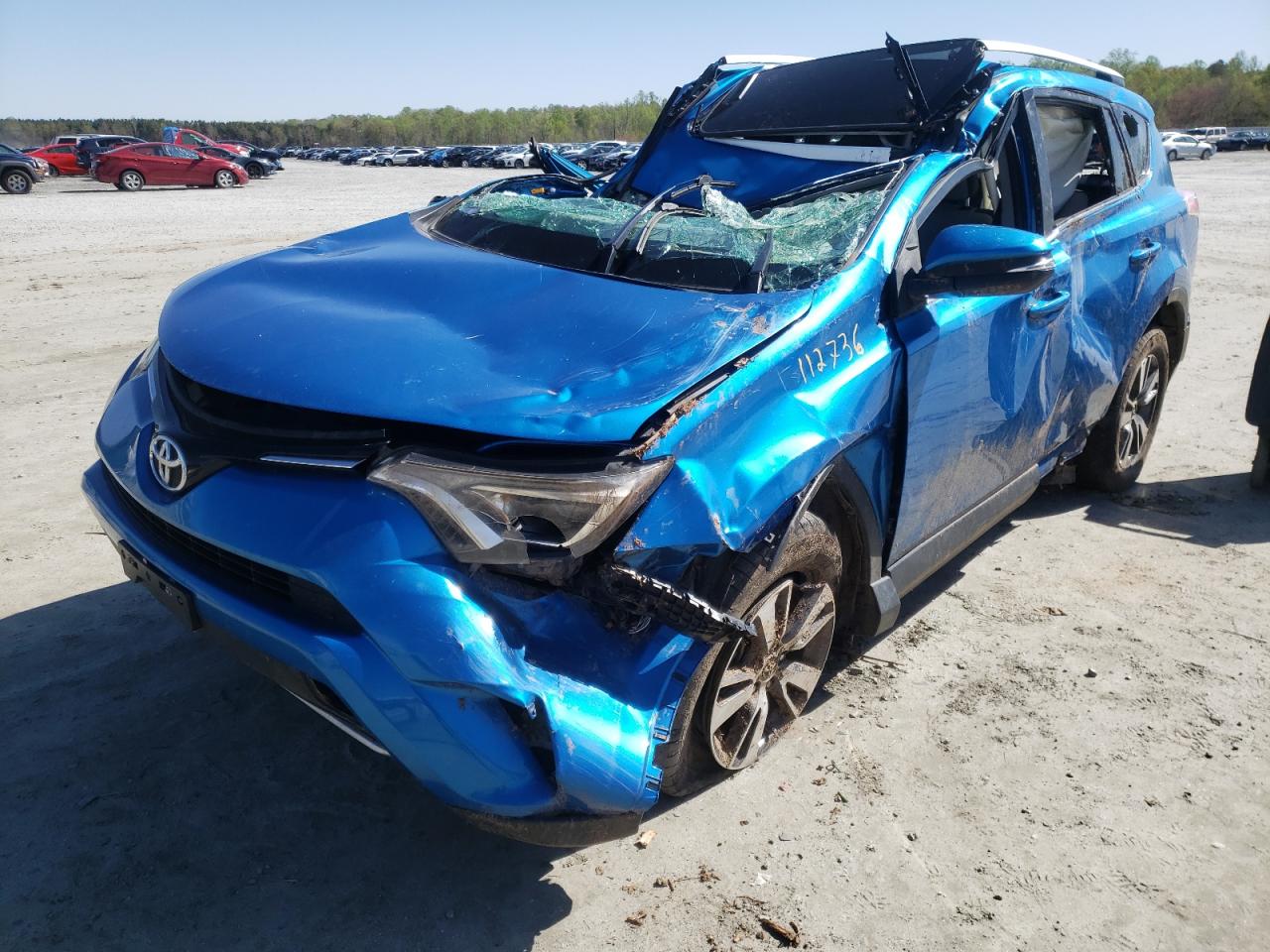 Photo 2 from auction – 2016 TOYOTA RAV4 XLE with VIN JTMWFREV0GJ066439