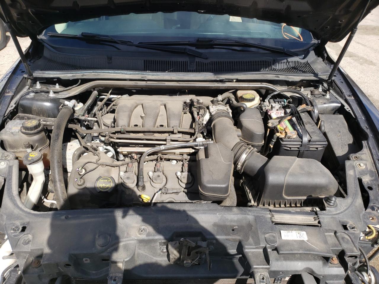 Photo 7 from auction – 2016 FORD TAURUS SEL with VIN 1FAHP2H86GG111695