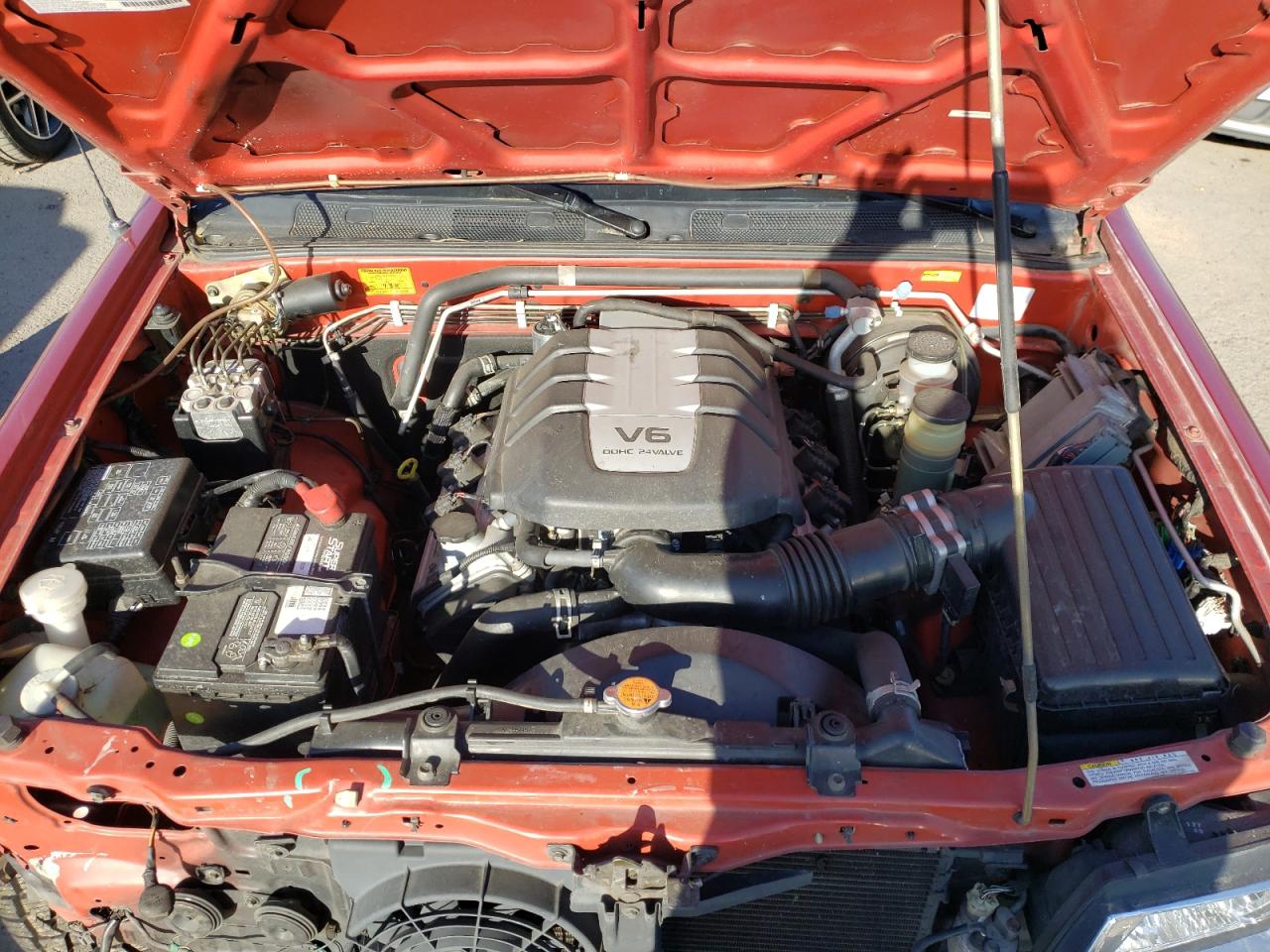 Photo 7 from auction – 2000 HONDA PASSPORT E with VIN 4S6DM58W8Y4414419