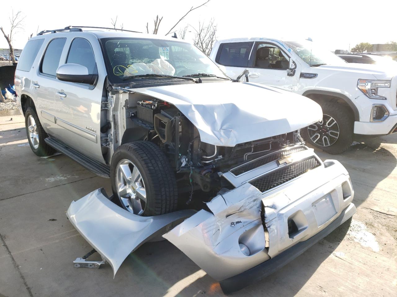 CHEVROLET TAHOE C150 2011 with VIN 1GNSCBE04BR145682 - Photo from auction