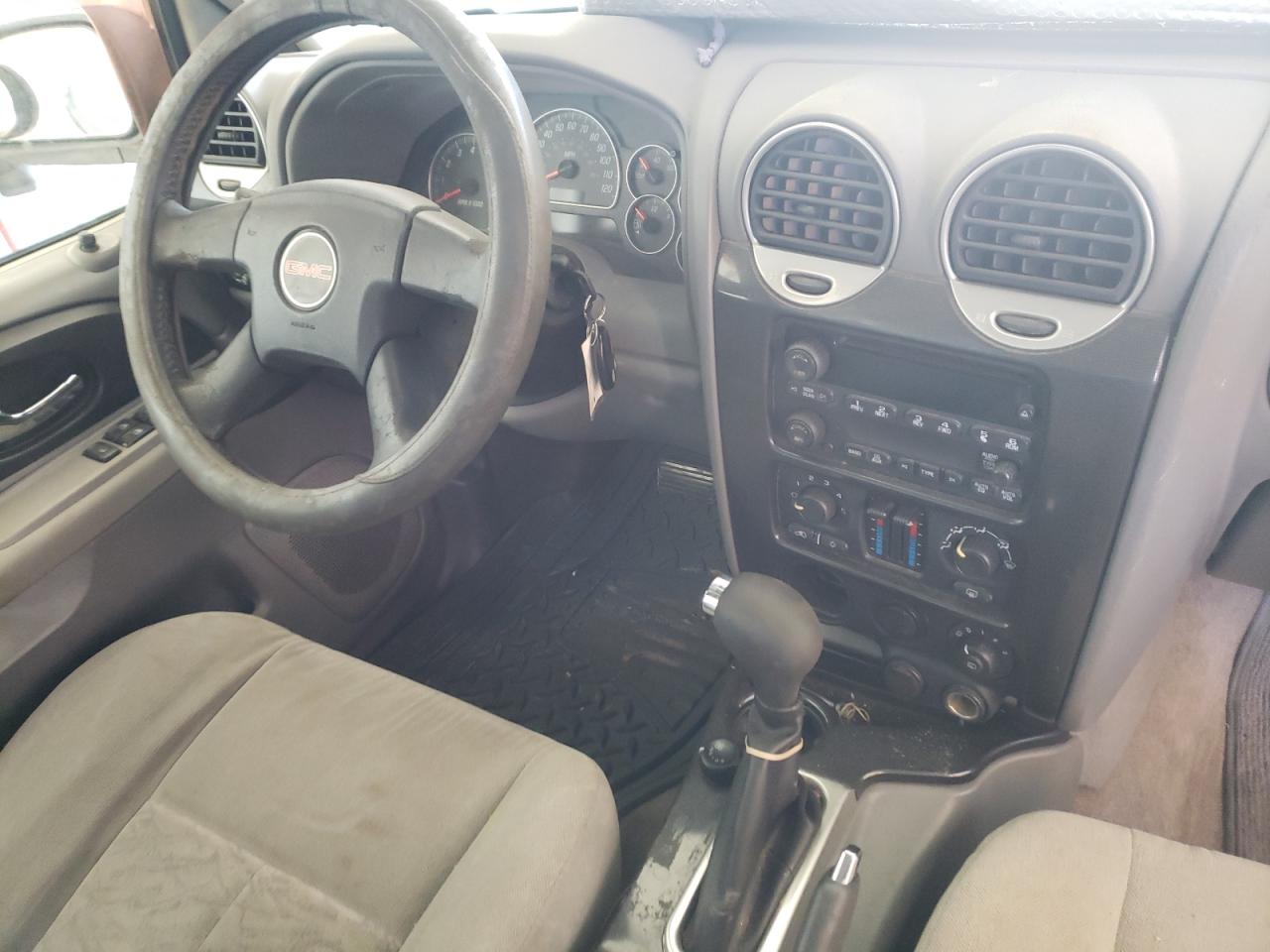 Photo 9 from auction – 2005 GMC ENVOY XL with VIN 1GKES16S256141210