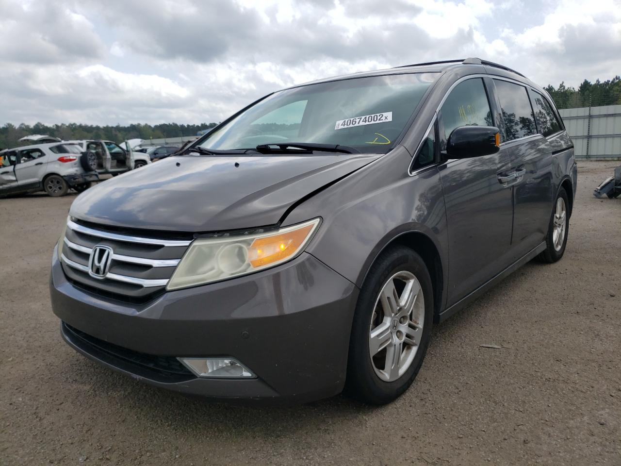 Photo 2 from auction – 2011 HONDA ODYSSEY TO with VIN 5FNRL5H9XBB095931