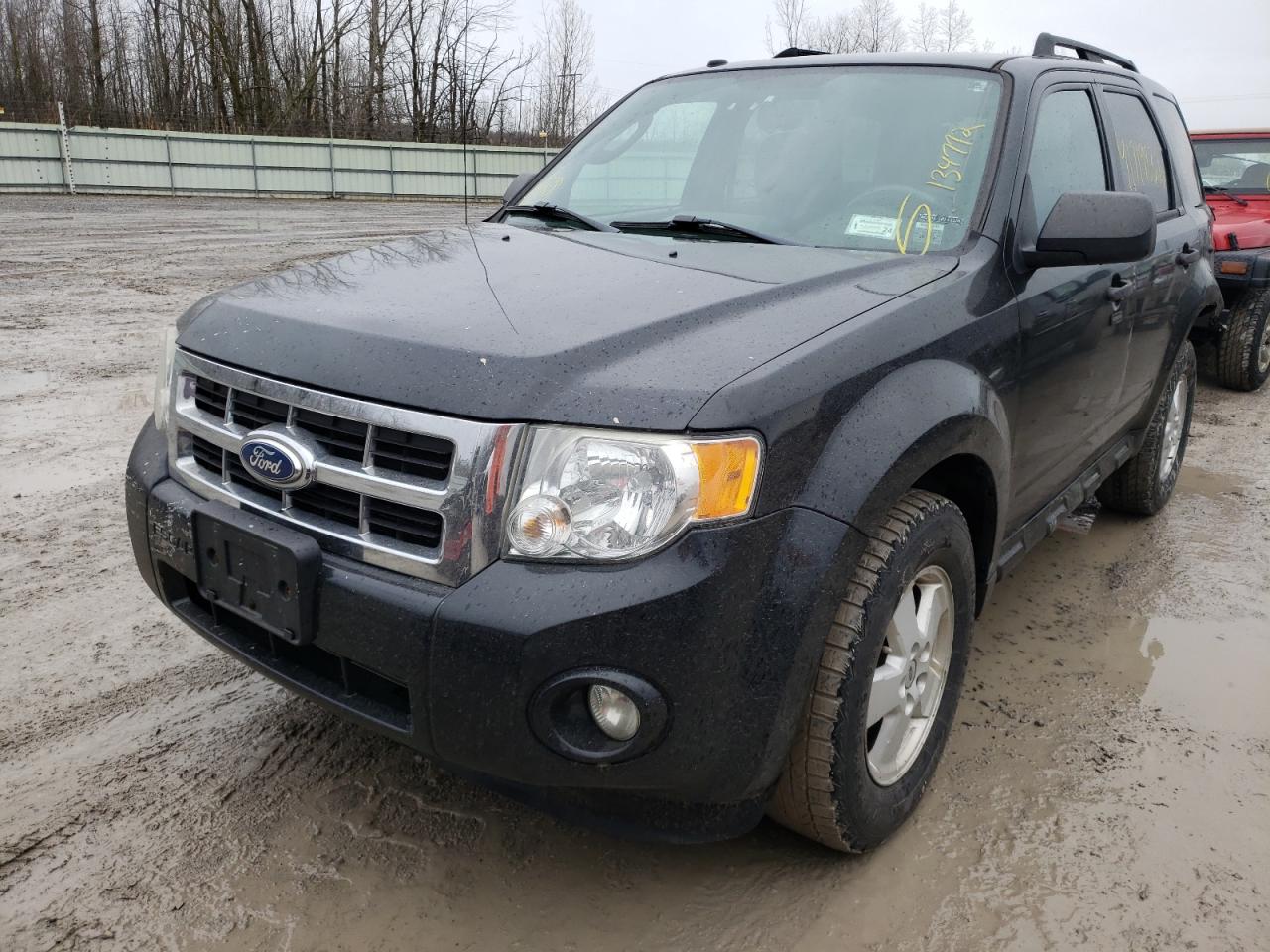 Photo 2 from auction – 2011 FORD ESCAPE XLT with VIN 1FMCU9DGXBKB60323