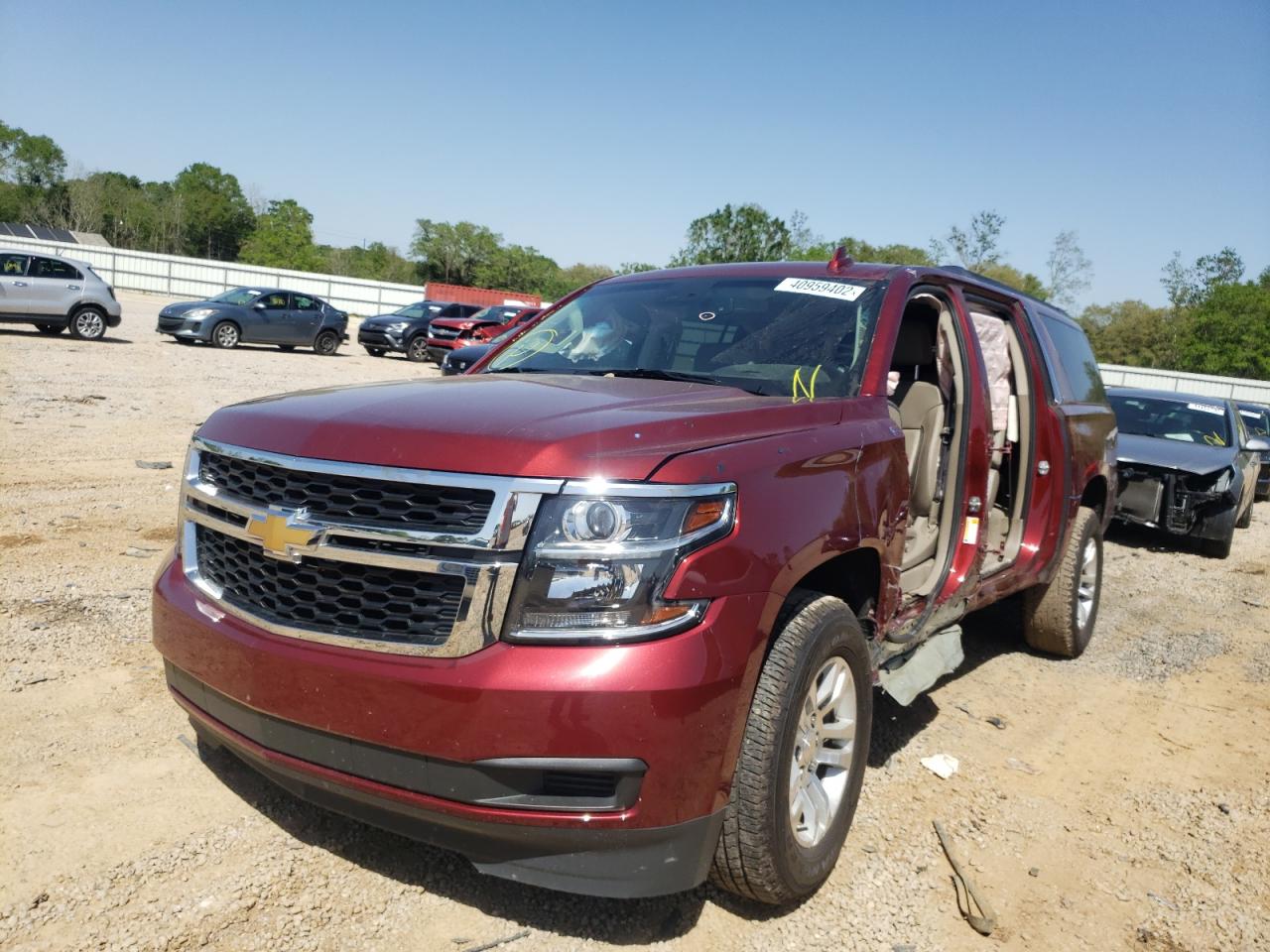 Photo 2 from auction – 2019 CHEVROLET SUBURBAN C with VIN 1GNSCHKC9KR256679
