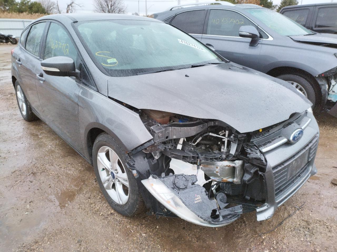 FORD FOCUS SE 2014 with VIN 1FADP3K28EL192390 - Photo from auction