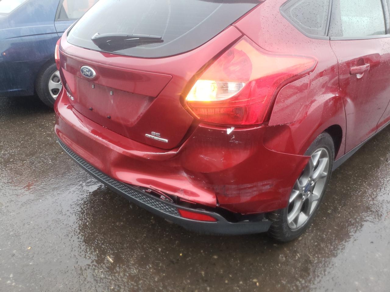 Photo 9 from auction – 2014 FORD FOCUS SE with VIN 1FADP3K28EL455414