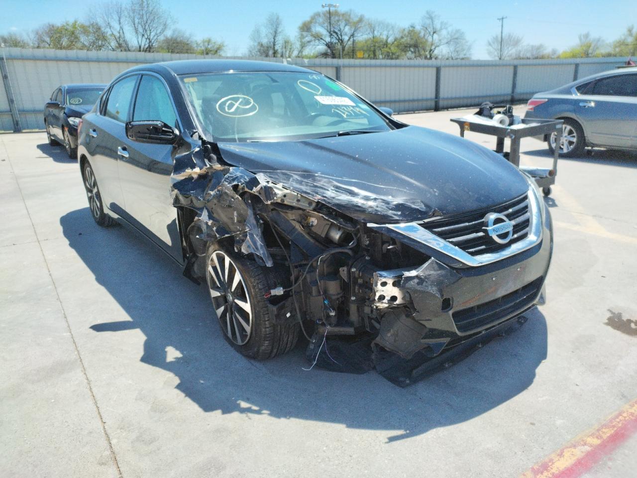 NISSAN ALTIMA 2.5 2018 with VIN 1N4AL3AP3JC213491 - Photo from auction