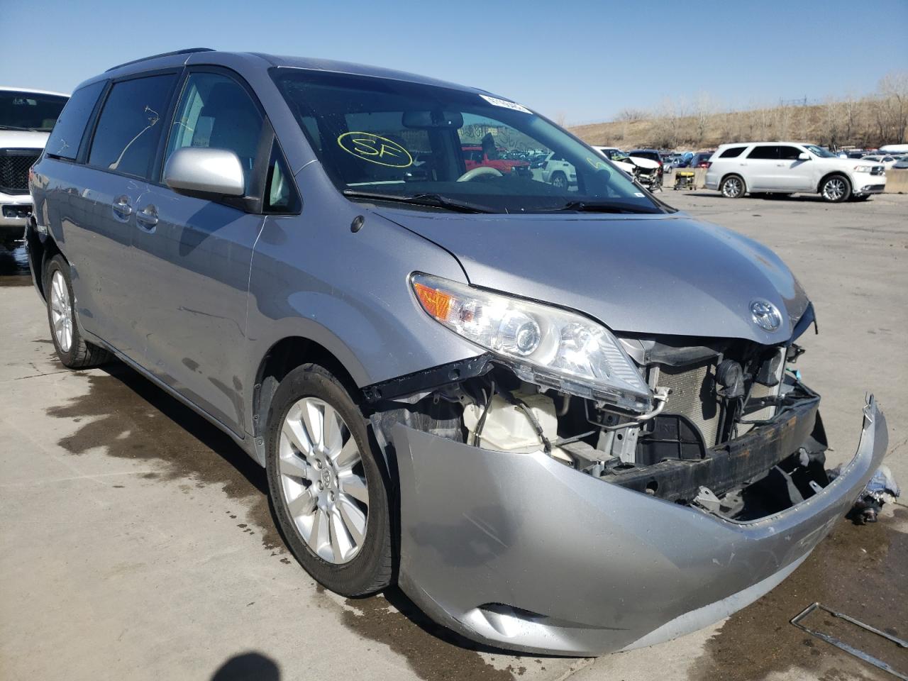 TOYOTA SIENNA LE 2011 with VIN 5TDJK3DC9BS003855 - Photo from auction