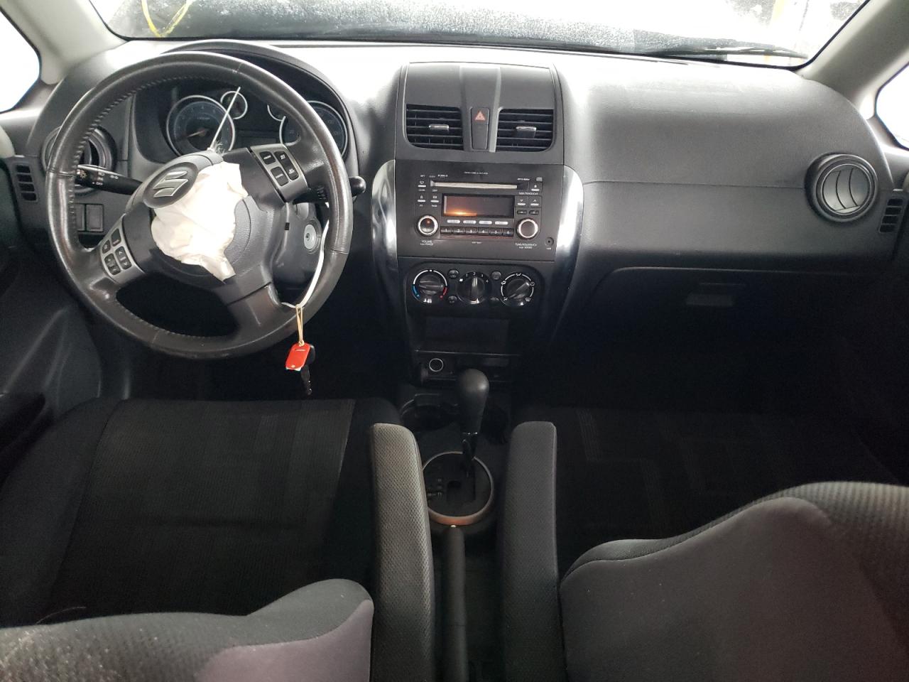 Photo 9 from auction – 2012 SUZUKI SX4 LE with VIN JS2YC5A36C6301041