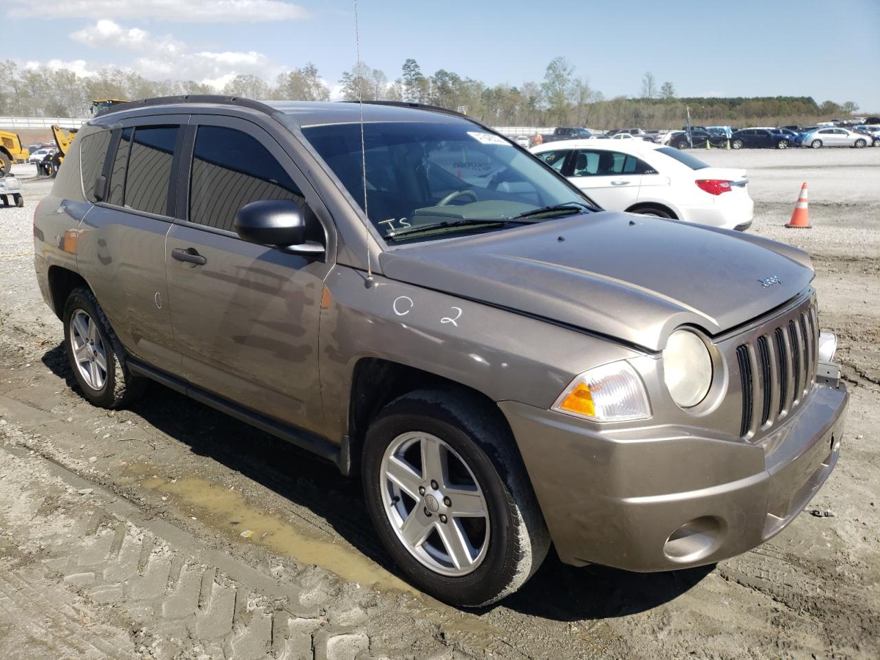 JEEP COMPASS 2007 with VIN 1J8FF47W97D278773 - Photo from auction