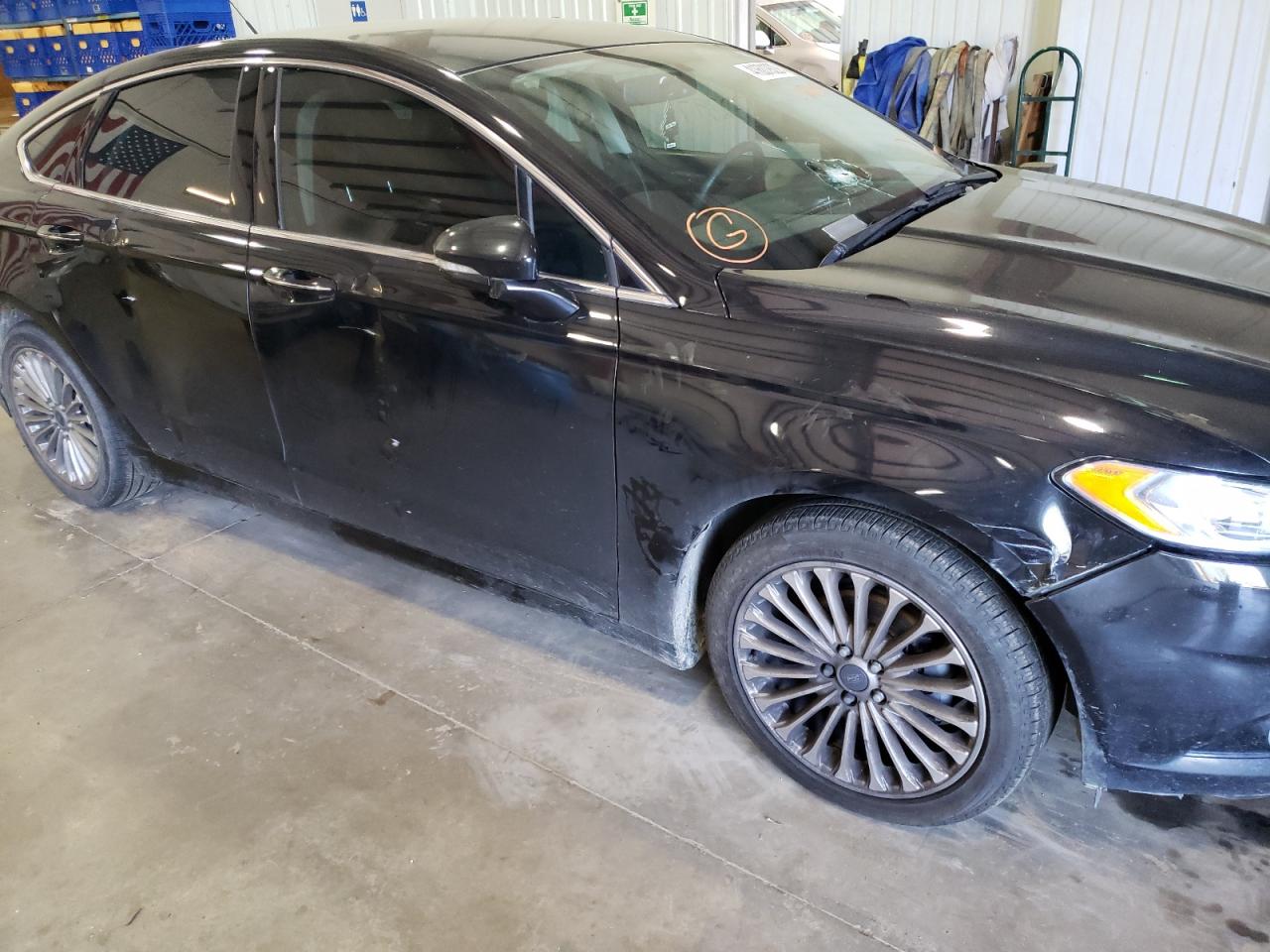 Photo 9 from auction – 2014 FORD FUSION TIT with VIN 3FA6P0K97ER184643