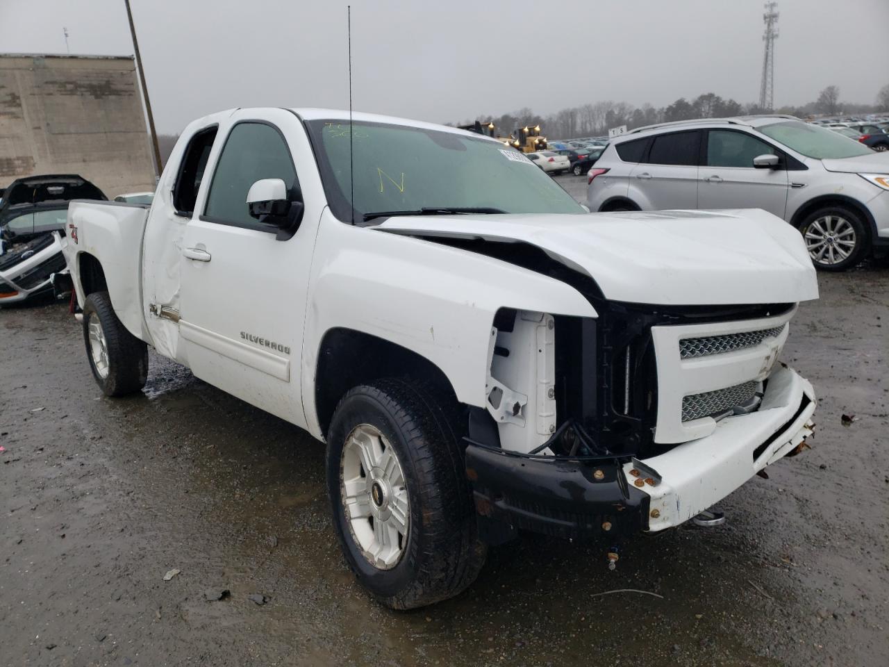 CHEVROLET SILVERADO 2011 with VIN 1GCRKSE34BZ148022 - Photo from auction