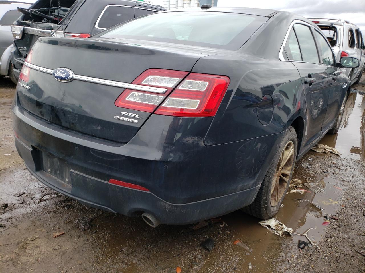Photo 14 from auction – 2013 FORD TAURUS SEL with VIN 1FAHP2E83DG228909