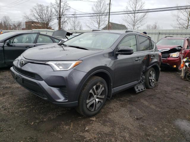 Photo 2 from auction – 2017 TOYOTA RAV4 LE with VIN JTMBFREV0HJ118281