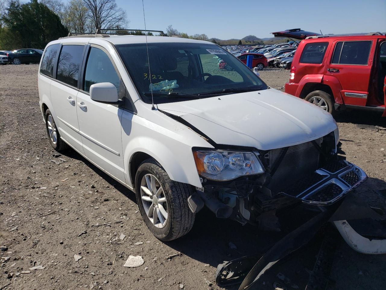 DODGE GRAND CARA 2015 with VIN 2C4RDGCG0FR536667 - Photo from auction