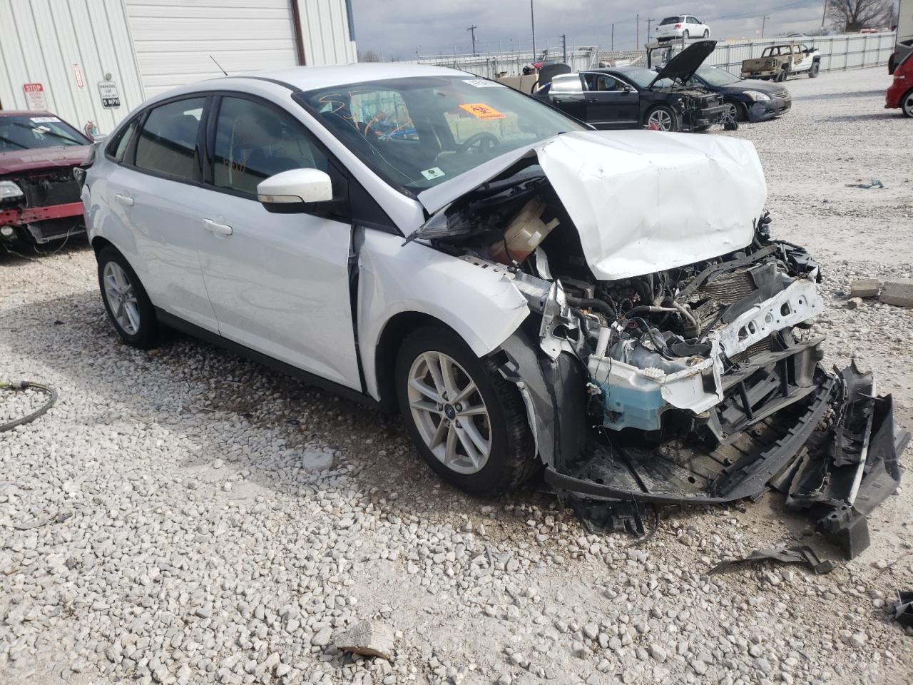 FORD FOCUS SE 2016 with VIN 1FADP3F21GL399720 - Photo from auction