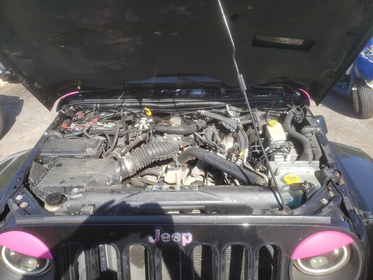 Photo 7 from auction – 2011 JEEP WRANGLER U with VIN 1J4HA5H10BL632499