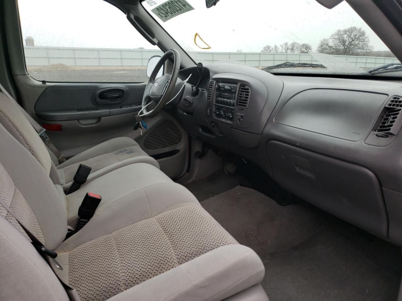 Photo 5 from auction – 2003 FORD F150 with VIN 1FTRX18LX3NB59932