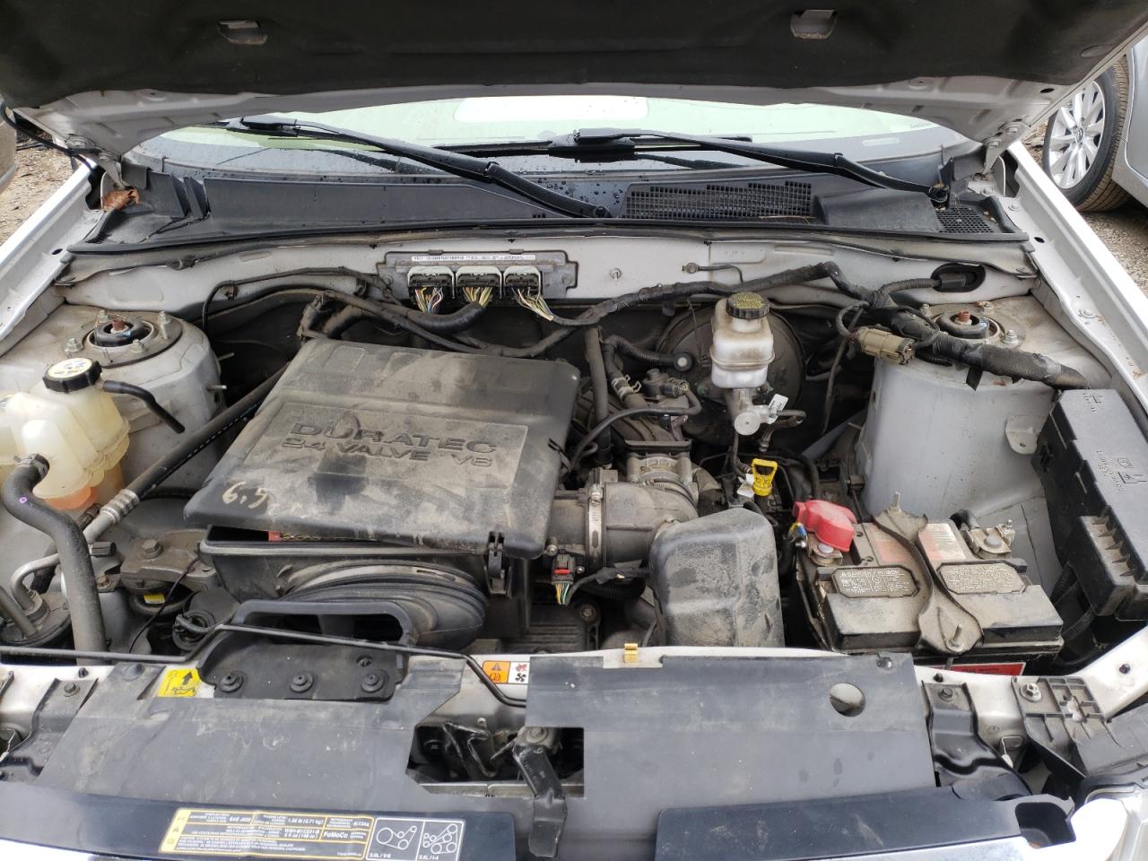 Photo 7 from auction – 2011 FORD ESCAPE LIM with VIN 1FMCU9EG7BKB63033